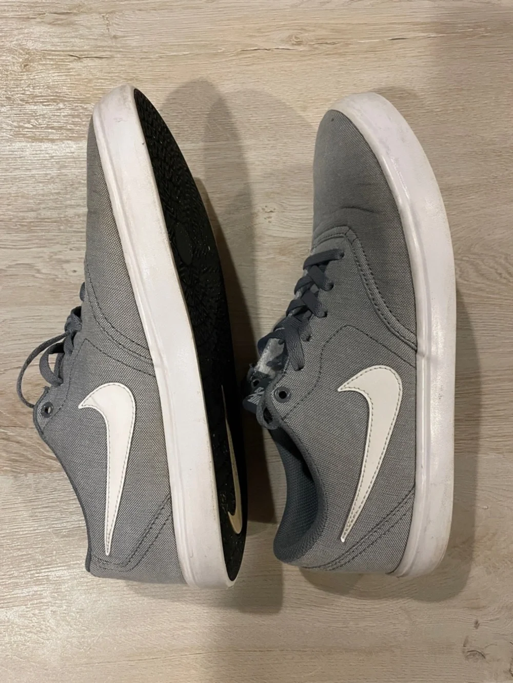 Nike Gray Canvas Low-Top Sneakers with White Swoosh